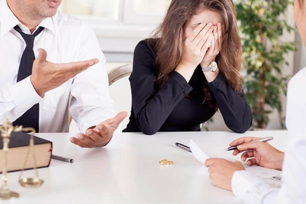 A couple of people discussing North Carolina adultery