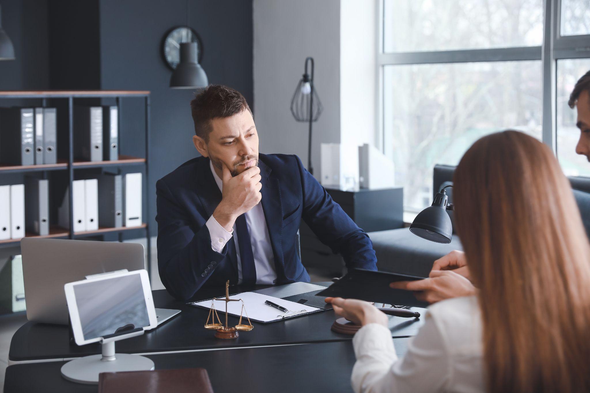 Couple discussing with North Carolina child custody attorney