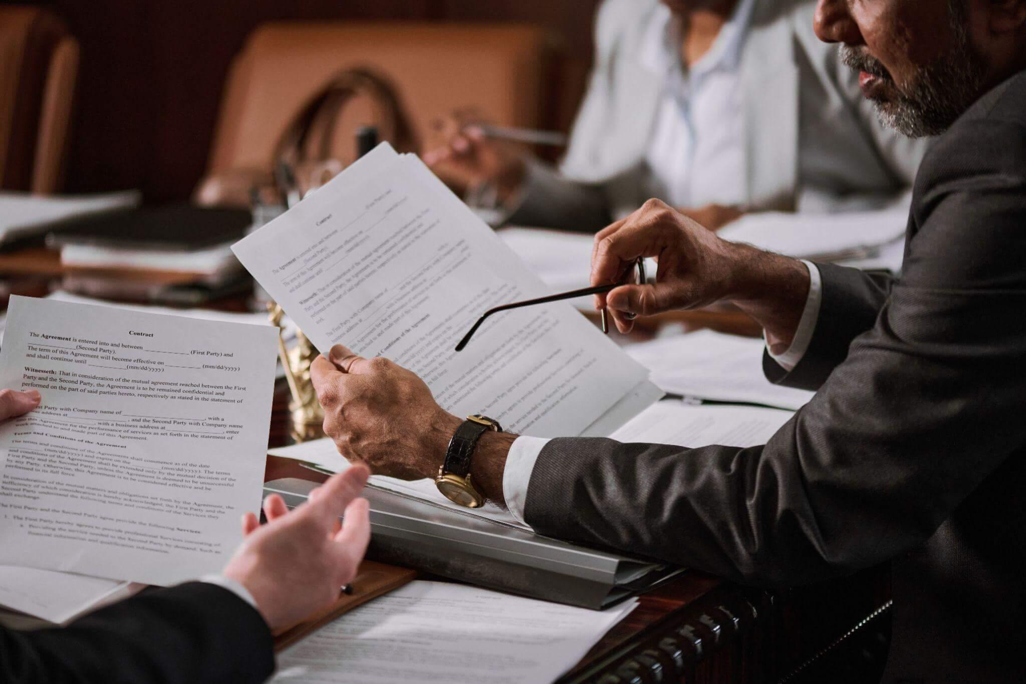 Group of people reviewing North Carolina business dissolution