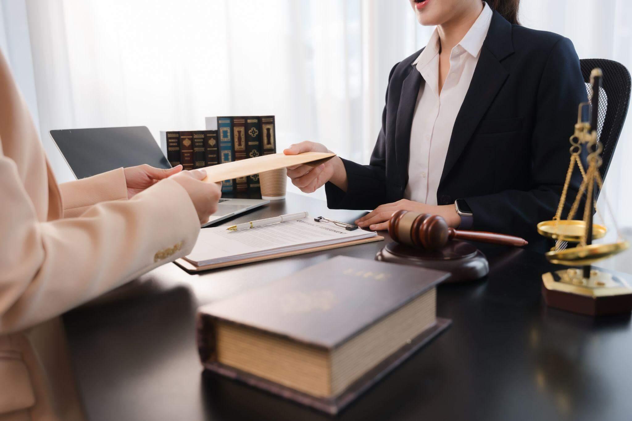 A North Carolina estate planning attorney discusses documents with