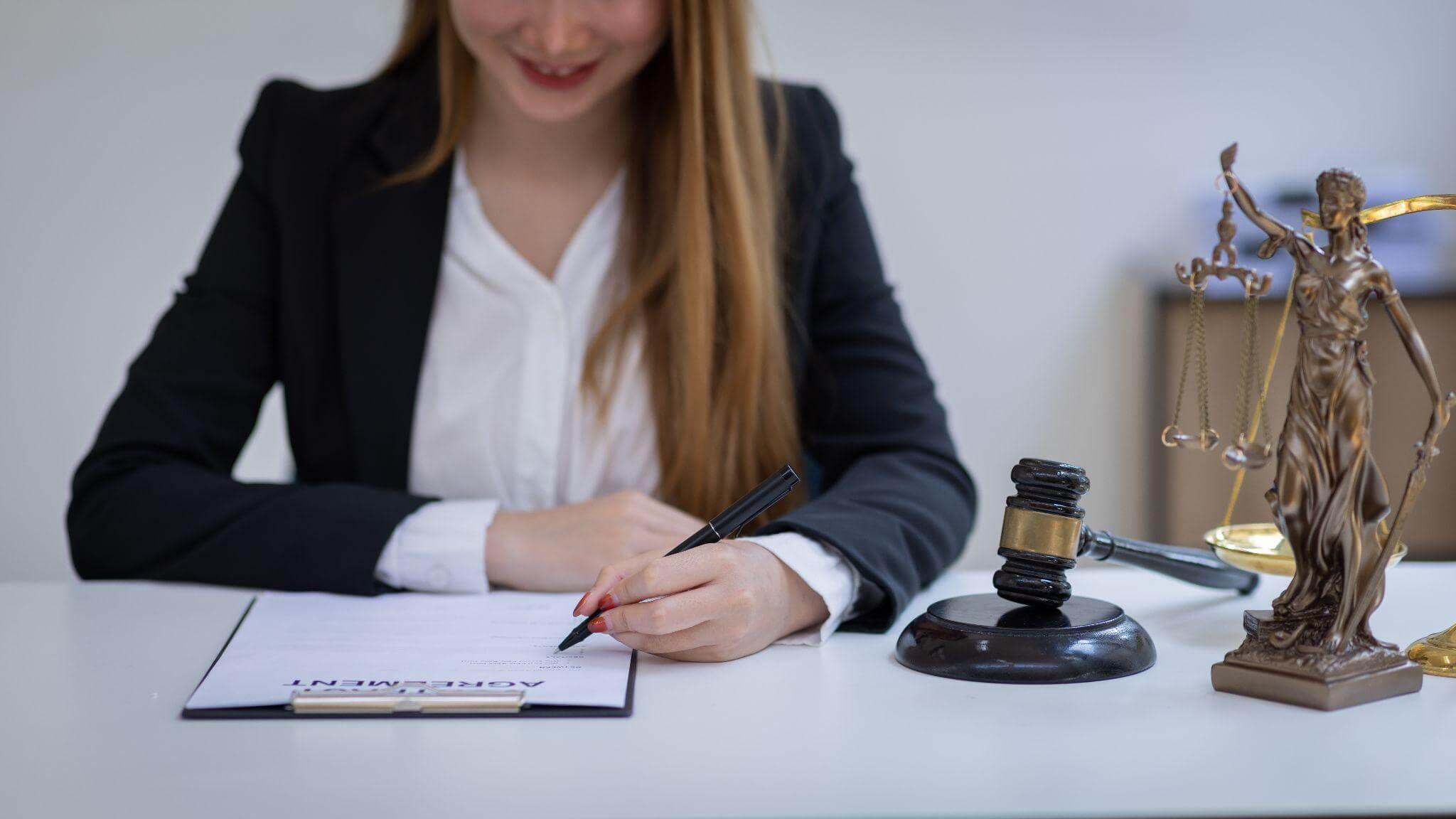 Woman writing a client review for white collar